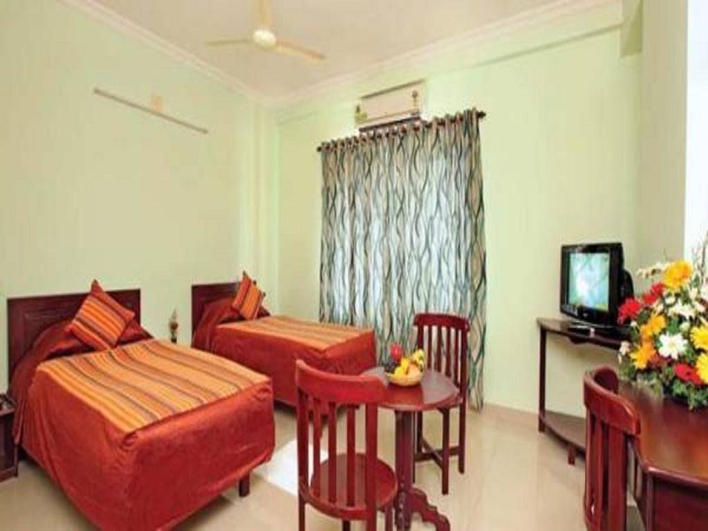 Sm Regency Kochi Habitación foto