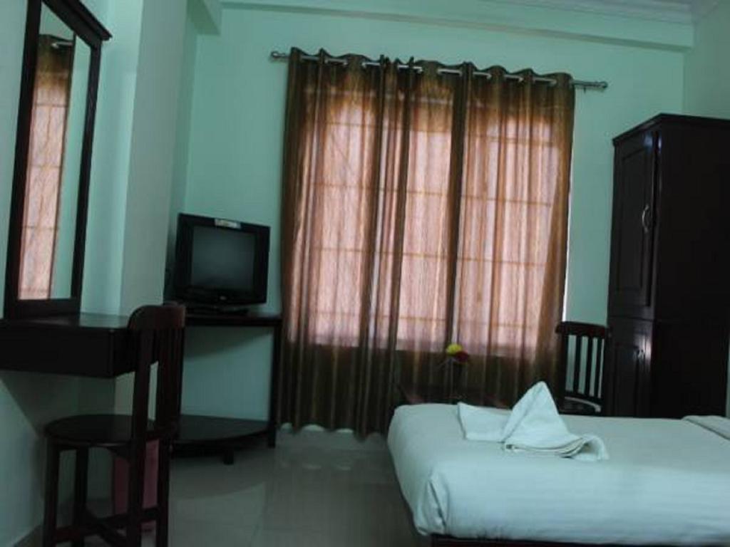 Sm Regency Kochi Habitación foto